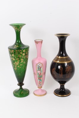 Lot 263 - 19th century pink glass vase with polychrome decoration together with large black glazed pottery vase with classical decoration
