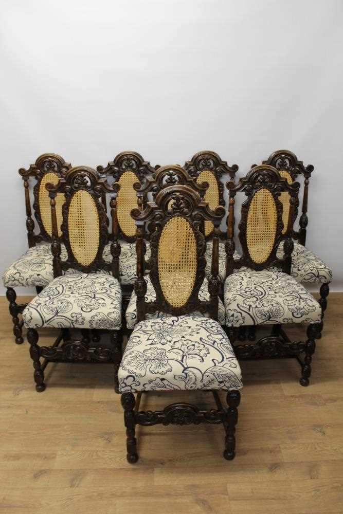 Lot 1411 - Set of eight Jacobean style carved oak high back dining chairs.