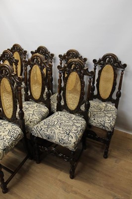 Lot 1411 - Set of eight Jacobean style carved oak high back dining chairs.