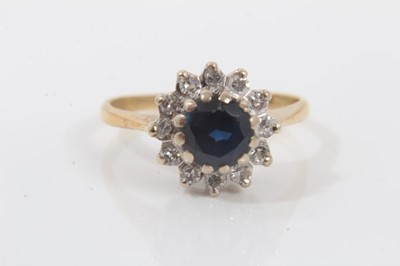 Lot 146 - 18ct gold sapphire and diamond flower head cluster ring