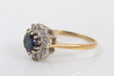 Lot 146 - 18ct gold sapphire and diamond flower head cluster ring