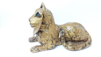 Lot 1199 - Contemporary pottery seated lion sculpture with gilt paintwork