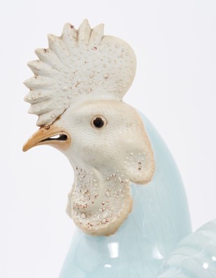 Lot 52 - Large Chinese celadon glazed model of a cockerel, with biscuit glazed face and crest, 19th/20th century, measuring 38.5cm high