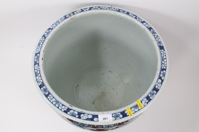 Lot 261 - Large Chinese porcelain fish bowl, 20th century, decorated in underglaze blue and red with landscape scenes and patterned borders