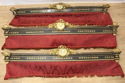 Lot 1378 - Set of three 19th century ebonised and gilt gesso pelmets