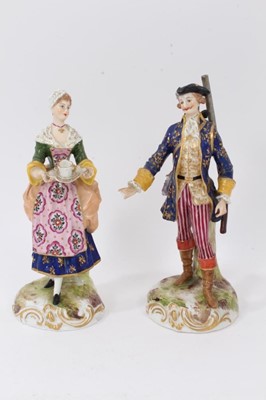 Lot 374 - A pair of German porcelain figures of a shepherd and shepherdess, in Derby style