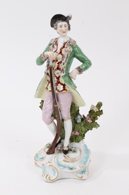 Lot 73 - A Continental porcelain figure of a sportsman, in Derby style, and a figure of a young girl