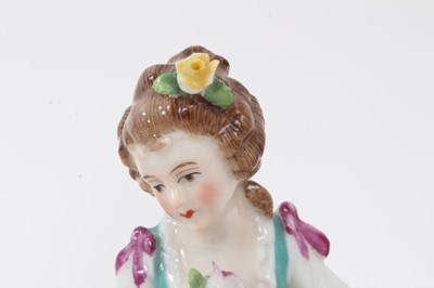 Lot 285 - A Continental porcelain figure of a sportsman, in Derby style, and a figure of a young girl