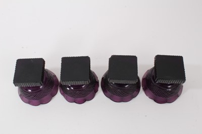 Lot 271 - A set of four 19th century amethyst tinted glass salts