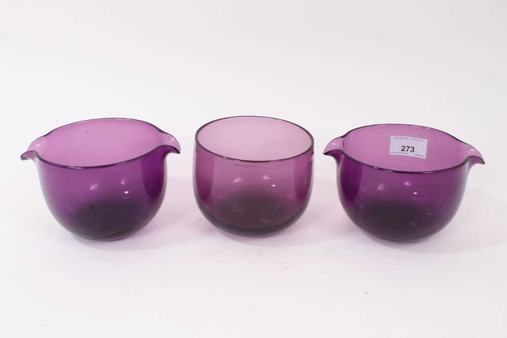 Lot 273 - A pair of 19th century amethyst tinted glass double lipped wine glass coolers, and a finger bowl