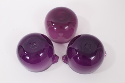 Lot 273 - A pair of 19th century amethyst tinted glass double lipped wine glass coolers, and a finger bowl