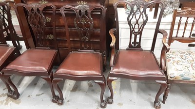 Lot 1048 - Set of six Georgian style Chippendale revival mahogany dining chairs with pierced splat backs and drop in seats on cabriole legs with claw and ball feet, comprising two carvers and four standards