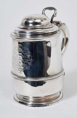 Lot 445 - George II silver-lidded tankard of bellied form with applied reeded girdle and scroll handle