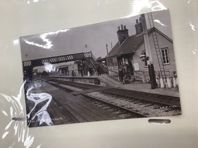 Lot 1433 - Postcards in three albums. All periods real photographic including Railway Station interior , topographic, artist drawn