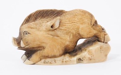 Lot 767 - Late 19th century Japanese carved ivory netsuke in the form of a running boar , signed 6.5 cm