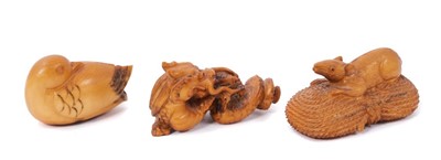 Lot 768 - Three Japanese stained ivory netsuke including rat on bale of rope, signed 5.1 cm , bird and dragon (3)