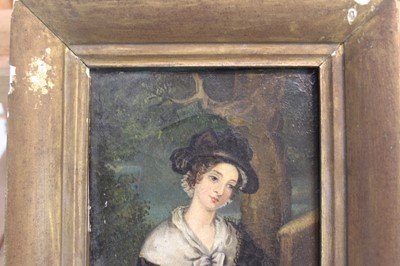 Lot 150 - 1830s English School, oil on canvas - portrait of a lady among woodland, named verso as Harriet Homer, dated 1837, 14cm x 11.5cm, in gilt frame