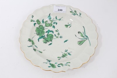 Lot 249 - A Worcester Giles-decorated plate, circa 1770, decorated in green with foliage, together with two 19th century Derby dishes, and two transfer ware platters (5)
