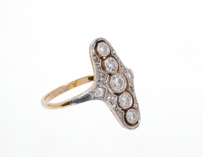 Lot 646 - Art Deco diamond plaque ring, the openwork plaque with five graduated old cut diamonds surrounded by single cut diamonds in platinum millegrain setting on 18ct yellow gold shank. Estimated total di...