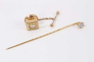 Lot 711 - Diamond stick pin with a brilliant cut diamond estimated to weigh approximately 0.40cts in gold claw setting.