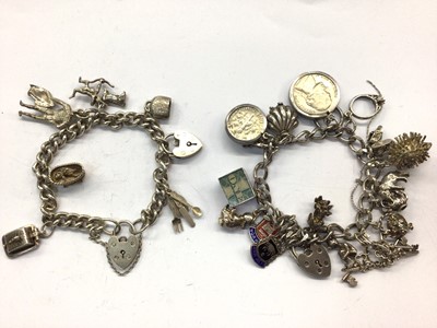 Lot 956 - Two silver charm bracelets