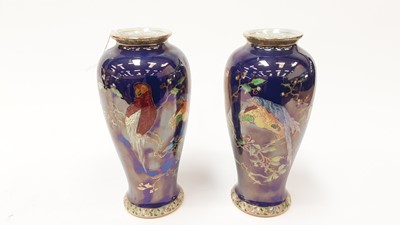 Lot 1124 - Pair of Carlton Ware lustre vases decorated with parrots on a blue lustre ground