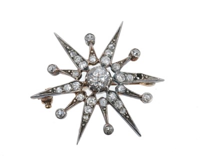 Lot 428 - Victorian diamond star brooch