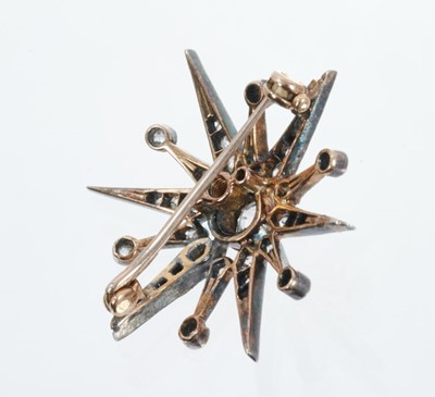 Lot 428 - Victorian diamond star brooch