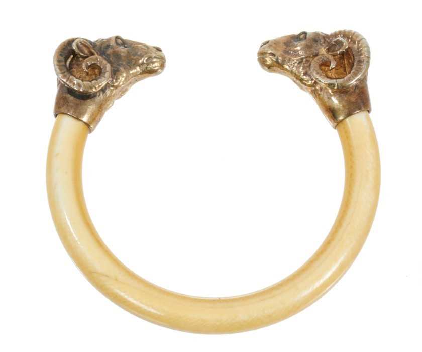 Lot 429 - Antique French Torque bangle with rams head