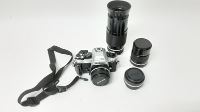 Lot 2454 - Nikon FA 35mm SLR camera with three Nikon Series E lenses - 28mm f/2,8, 50mm f/1.8 and 135mm f/2.8