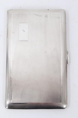 Lot 166 - Silver cigarette case of rectangular form with engine turned decoration