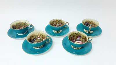 Lot 1108 - Set of five Aynsley Orchard Gold teacups and saucers, signed D.Jones, another similar unsigned cup and saucers, together with a porcelain two handled dish with floral decoration