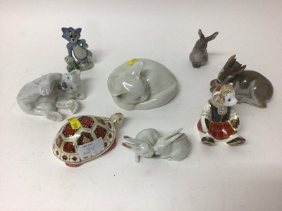 Lot 1116 - Five Royal Copenhagen porcelain models - Polar Bear no 729, Cat no 422, Deer no 2648, Rabbit no 1019 and rabbit group no 578