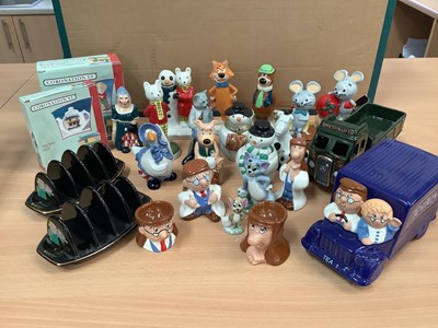 Lot 1147 - Selection of Wade figures including Tom & Jerry, Yogi Bear, Rupert, Mr Jinks, Pixie, Dixie, Tetley items, Snowman figures, Andy Capp toast racks, Eddie Stowbart truck etc