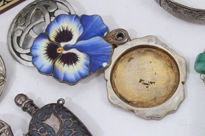 Lot 47 - Two silver bangles, silver (900) enamelled pansy locket/compact pendant, Continental silver perfume bottle, raw amber bracelet, other costume jewellery and small selection of coins