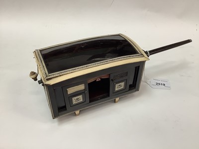 Lot 2519 - Rare early 19th century Anglo Indian horn and ivory model of a Palanquin with red velvet lining, sliding doors, shutters, lamp and carrying poles. 17cm overall length, excluding carrying poles