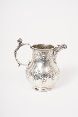 Lot 326 - Victorian silver jug by Henry Holland, London 1875