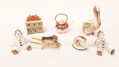 Lot 1157 - Selection of Royal Crown Derby item including Exclusive Edition paperweight - White Pelican No 1604 of 5000, The Special Edition paperweight - China Shop, Piglet, miniature Wheelbarrow, miniature K...