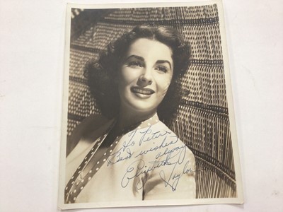 Lot 1438 - Autograph Elizabeth Taylor Actress 1940's Portrait Photograph hand signed ' To Peter Best Wishes Always Elizabeth Taylor'. Plus film stills