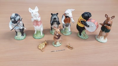 Lot 1177 - Seven Beswick Pig Band figures