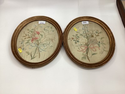 Lot 2743 - Pair of antique silk embroidered panels in oval frames