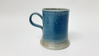 Lot 1181 - Steve Harrison studio pottery salt glazed mug/tankard, dated 1999, 10cm high