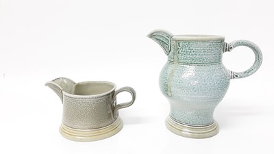 Lot 1188 - Steve Harrison studio pottery salt glazed jug dated 1998, 7.5cm high, together with another dated 1999, 16cm high, damaged spout (2)