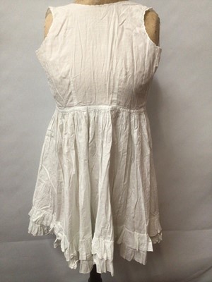 Lot 2154 - A selection of Victorian/ Edwardian babies clothing including four caps, three lace and embroidery Christening gowns, two Christening petticoats, also a girl's cut-out work dress and a plain pettic...