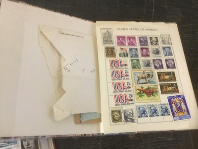 Lot 214 - Two folders of stamps, framed cigarette cards and a tin of tea cards