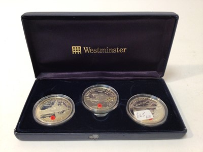 Lot 422 - Channel Islands - Westminster issued silver proof three coin Five Pound proof set, 60th Anniversary of D-Day (with coloured poppy motif) to include Alderney, Guernsey and Jersey 2004 (N.B. Cased bu...