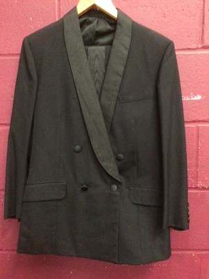 Lot 2167 - 1969 Gentlemen's Huntsman & Sons Ltd, Savile Row Black Evening Suit.  Jacket has Moire fabric revers and similar trouser stripes.