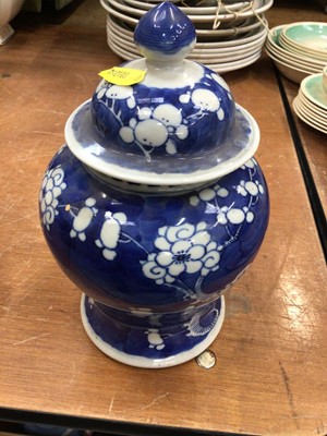 Lot 416 - Chinese porcelain jar and cover with prunus decoration on crushed ice ground