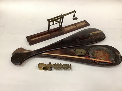 Lot 2538 - A brass set of sovereign scales by Harrison, a further fold out set of sovereign scales, and a set of opium scales (3)