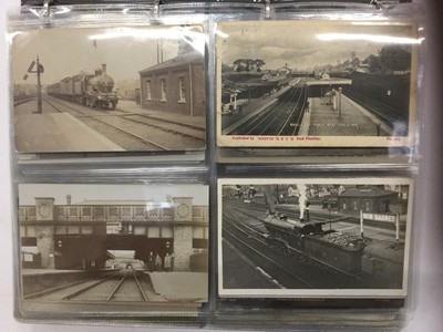 Lot 1401 - Postcards in album mainly topography of Barnet and North London area. Real photographic cards include Railway interiors, exteriors and trains. Animated High Street Barnet with open top tram, Intern...